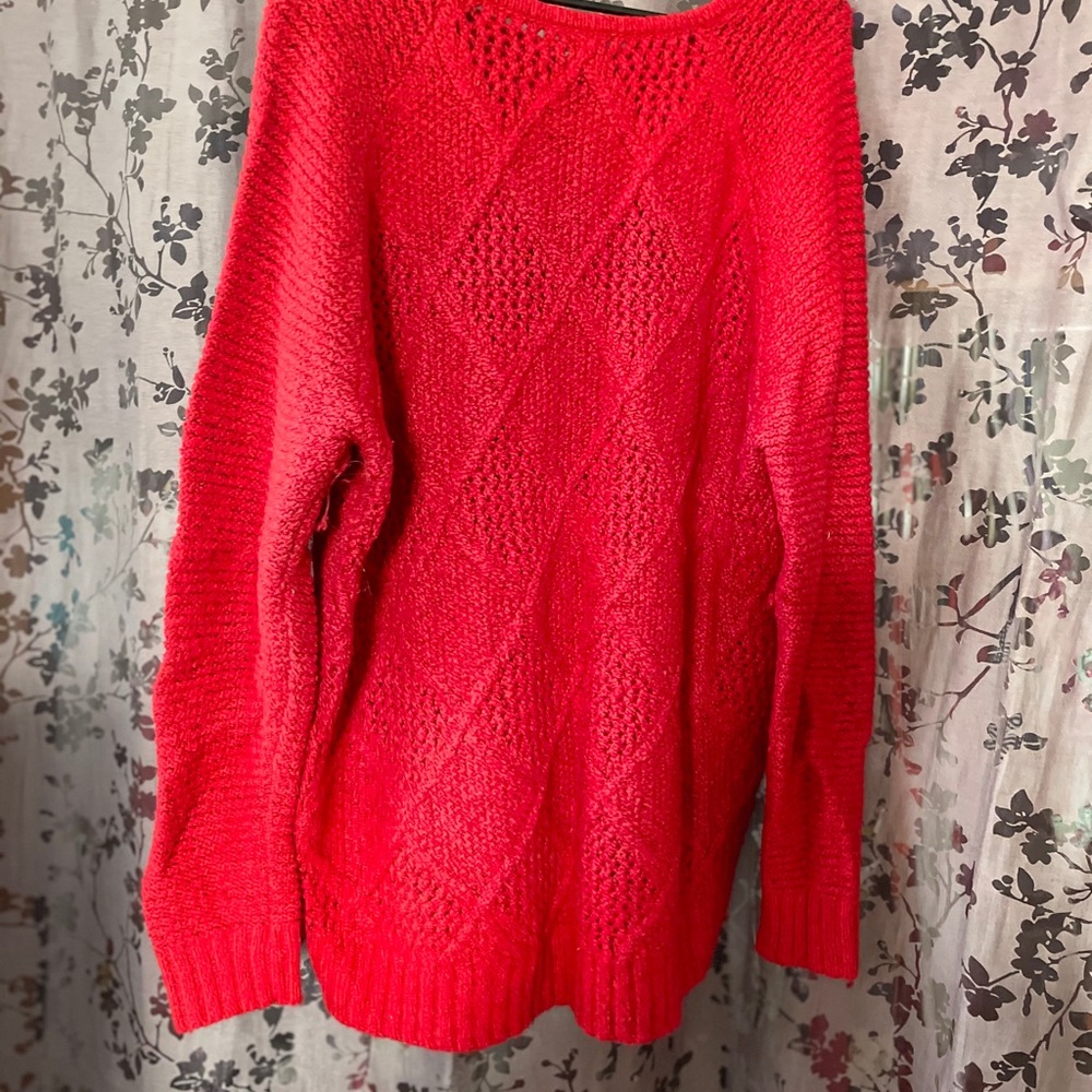 Women’s red cable knit sweater